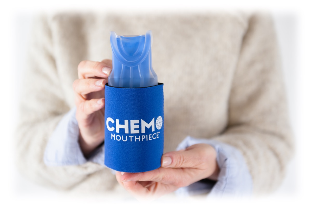 Hands holding a Chemo Mouthpiece in its branded sleeve