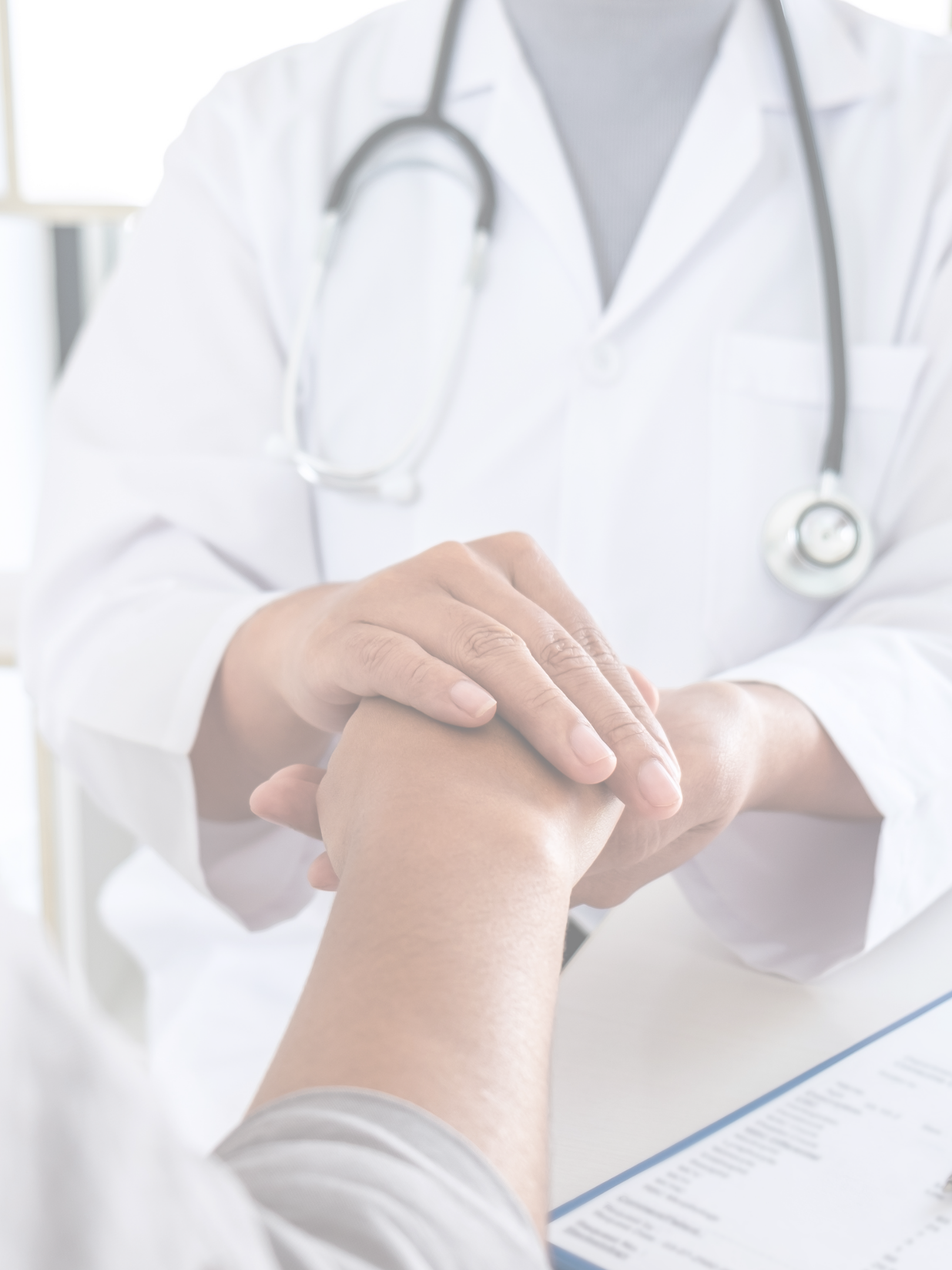 Doctor holding patient's hand